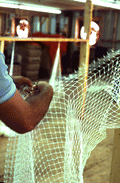 Billy Burbank II weaving a fishing net - Fernandina Beach, Florida