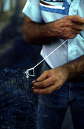 Billy Burbank II weaving a fishing net - Fernandina Beach, Florida