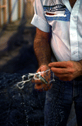 Billy Burbank II weaving a fishing net - Fernandina Beach, Florida