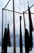 Fishing nets made by Burbank Trawl Makers hanging from pulleys - Fernandina Beach, Florida