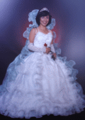 Fifteen year old Cuban American girl in her Fiesta de Quince dress - Miami, Florida.