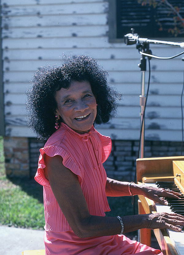 Ida Goodson playing blues on the piano at the West Florida Folklife Area festival - Pensacola, Florida.