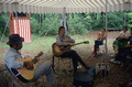 Gamble Rogers (R) and blues guitarist/singer Roy Book Binder performing at 1982 Florida Folk Festival- White Springs, Florida