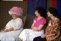 Thelma Boltin (L), "Queen of Florida Folklife", observing action at the Folk Festival's main stage with folklorists Peggy Bulger and Doris Dyen (R)- White Springs, Florida