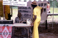 Mary McClain at her booth, talking to a woman - White Springs, Florida