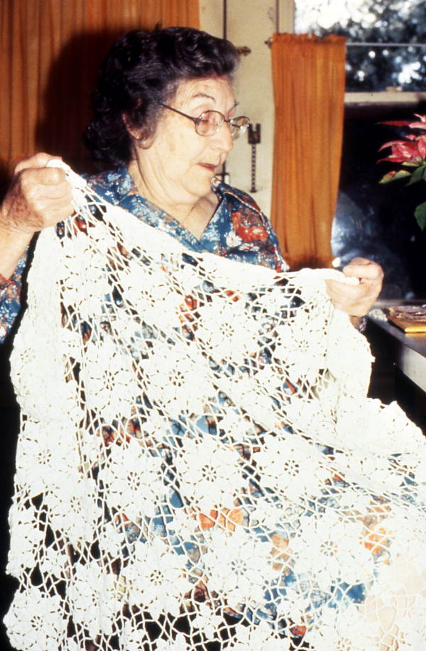 Theresa Griffin displaying an example of Minorcan crochet and needlework at Elkton, Florida (January 1985).