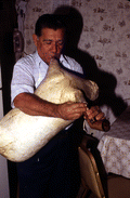 Nikitas Tsimouris playing a tsambouna - Tarpon Springs, Florida
