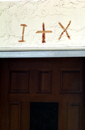 Symbols in sheep's blood over Nikitas Tsimouris' door - Tarpon Springs, Florida.