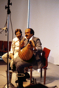 Fahed Iwais, an Arabic singer, speaks while David Taylor listens - Jacksonville, Florida.