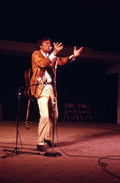 Gamble Rogers telling a story at the 1985 Florida Folk Festival - White Springs, Florida