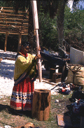 Susie Jim Billie pounds corn - Ochopee, Florida