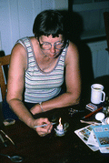 Evelyn Coskey working with stylus during Polish egg decoration (pysanky) - Starke, Florida