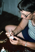 Evelyn Coskey using stylus during Polish egg decoration (pysanky) demonstration - Starke, Florida