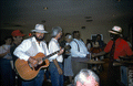 "Washboard Bill" Cooke performing street music with friends during Heritage Award reception at the 1992 Florida Folk Festival - White Springs, Florida