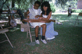 Eugenia Fitchen teaching a girl old-time dulcimer music at the Children's Activity Area- White Springs, Florida