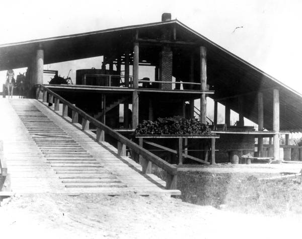 J.A. Phifer's three-deck still permitting gravity feed of rosin