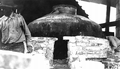 Beginning of brick arch over chimney throat of still