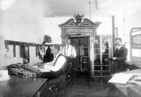 Interior of the Carlton and Carlton Bank in Wauchula. The bank was originally established in 1904 in a corner of the Wauchula Hardware Store. The bank moved into a building of its own in 1909, and in 1915 it was incorporated as the Carlton National Bank. Florida Governor Doyle E. Carlton was part of the Carlton family who established the bank (photo 1904).