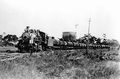 Apalachicola Northern Railroad locomotive and cars
