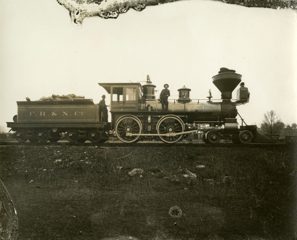 Florida Railway and Navigation Company crew posing on Engine number 46