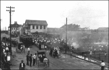 Remains of the "Gato Cigar Factory" at the corner of Simonton and Virginia streets following the fire that destroyed it: Key West, Florida (1915)