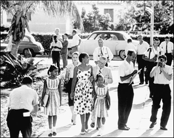 Mother escorts her two daughters to Orchid Villa School (September 7, 1959)