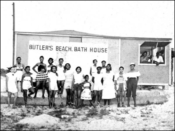Beach-goers assembled for a group portrait by the bath house at Butler Beach: Anastasia Island, Florida (195-)