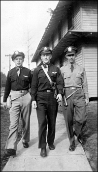 Pilots on the walk beside the barracks (1944)