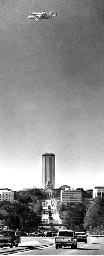 View of Space Shuttle flying over Florida's capitol building (1992)