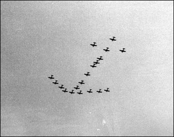 Naval air reserve training unit flyover in the shape of an anchor: Jacksonville, Florida (1948)