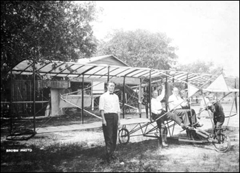 Men and early biplane: Kissimmee, Florida (ca. 1910)