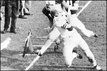 Lane Fenner catching football in FSU-Florida game: Tallahassee, Florida (1966)