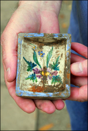 Painted ceramic artifact piece found during excavation of cistern at The Grove (2011)