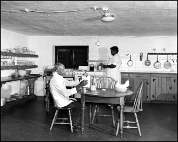 Grove staff members at work in the kitchen (1956)