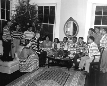 The Collins family hosting a delegation from the Seminole Tribe at The Grove (1956)