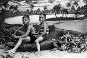 Stanley and Milton Weinkle sitting on a stuffed alligator: Miami Beach, Florida (1931)