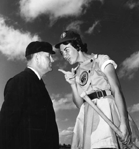 Fort Wayne Daisies player, Marie Wegman, of the All American Girls Professional Baseball League arguing with umpire Norris Ward: Opa-locka, Florida (1948)