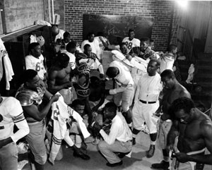 Coach Jake Gaither in the locker room with his FAMU football team: Tallahassee, Florida