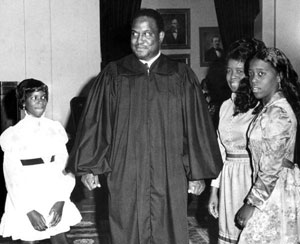 Supreme Court Justice Joseph W. Hatchett poses with his family: Tallahassee, Florida (1975)