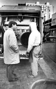 Florida Governor Bob Graham talking with a City of Tallahassee garbage collector: Tallahassee, Florida (1979)