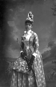 Nellie Franklin, holding a parasol