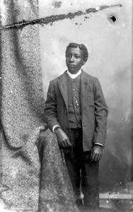 Young man in plaid coat and vest