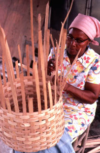 Lucreaty Clark making a white oak basket (not after 1979)