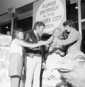 A fan asking for an autograph by actors and actress of the movie Frogs: Panama City, Florida (1972)