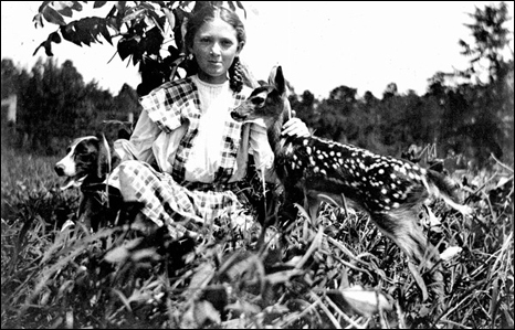 Eloise Morris with dog and fawn (ca. 1913)