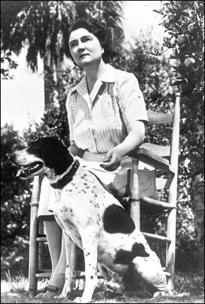Marjorie Kinnan Rawlings with her dog: Cross Creek, Florida (194-)