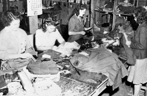 Women at Camp Gordon Johnston sewing on insignia (between 1942 and 1944)