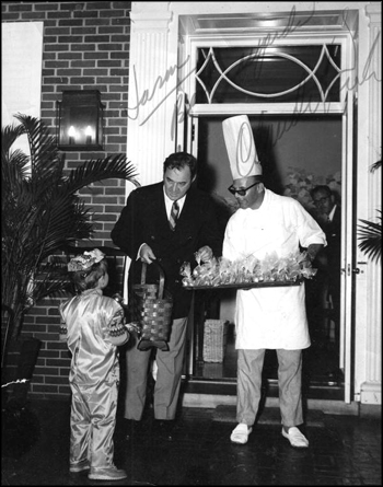 Jason Scott Turner receiving treats from Governor Claude Kirk during a Halloween party at the Governor's Mansion in Tallahassee, Florida (1968 or 1969)