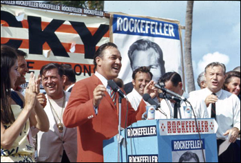 Florida Governor Claude Kirk speaking at campaign beach party for Republican presidential candidate Nelson Rockefeller: Miami Beach, Florida (August 1968)