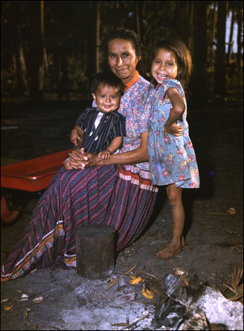 Seminole mother with her children: Brighton Seminole Indian Reservation, Florida (1949)